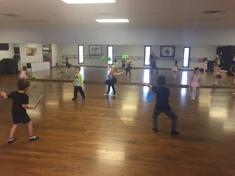 Kids in the studio playing and dancing